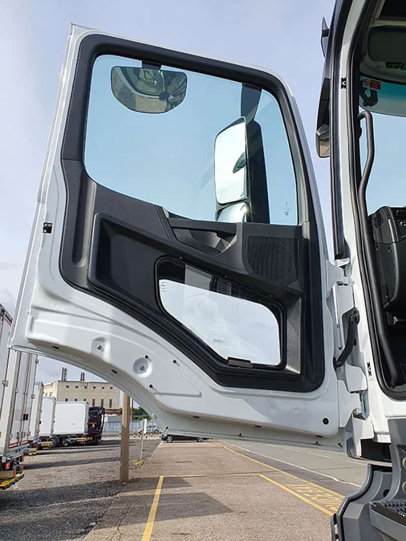 Mercedes Arocs open passenger door fitted with the Astra ClearView – Additional Low Level Passenger Side (Blind spot) Window for Heavy Goods Vehicles