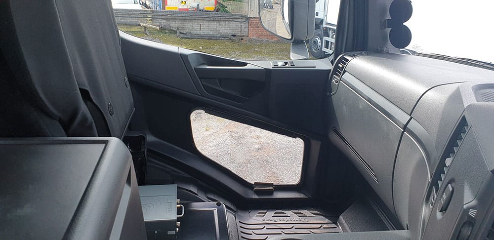 Mercedes Arocs passenger door fitted with the Astra ClearView – Additional Low Level Passenger Side (Blind spot) Window for Heavy Goods Vehicles